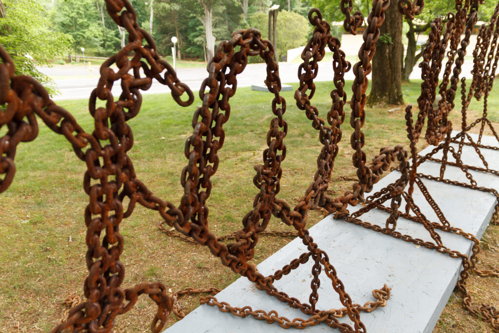 We the People, 2026. Outdoor public art commission produced for Under Construction: America at 250, Art Complex Museum, Welded steel chain, 2l' x 6' x 2. Detail Image.